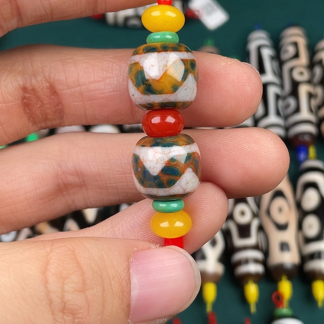 玛瑙/玉髓裸珠多彩虎牙