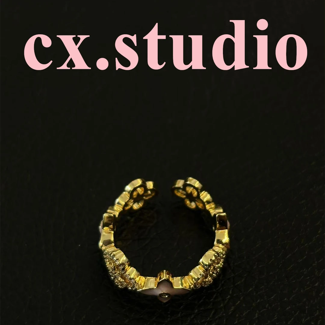 铜合金合成锆石戒指 轻奢四花戒指 2011