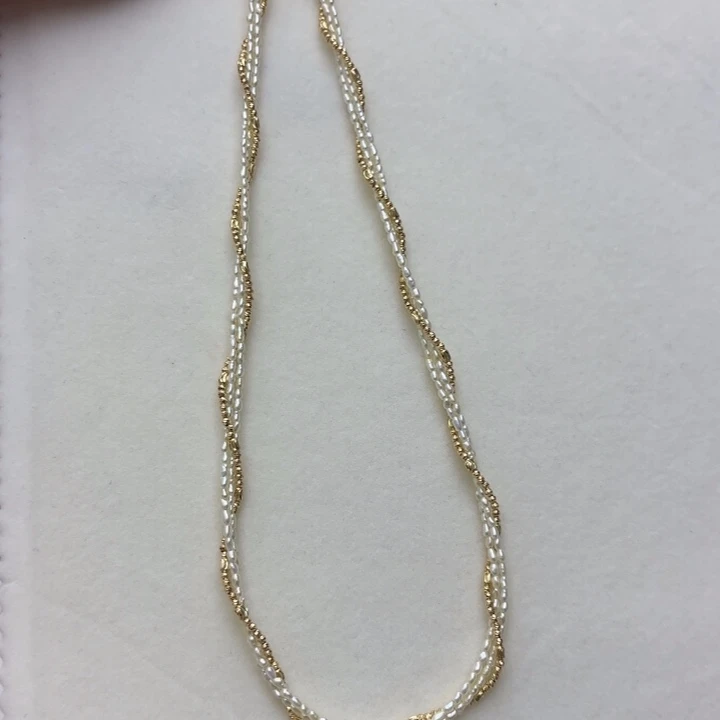 丁***海水珍珠18K金镶嵌颈饰