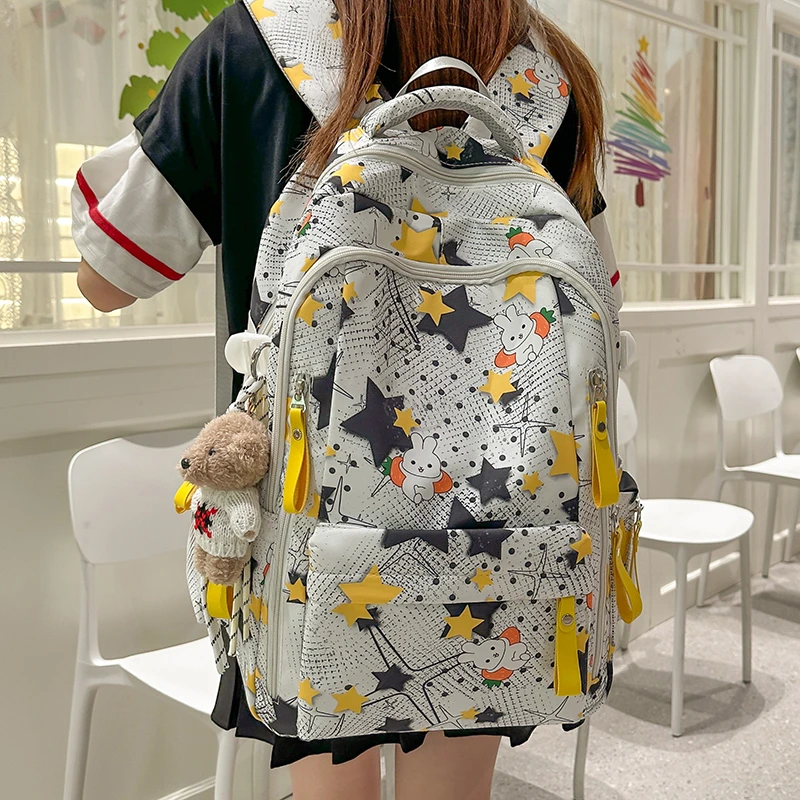 初高中学生书包女轻便高颜值大容量小学生三到六年级女孩双肩背包