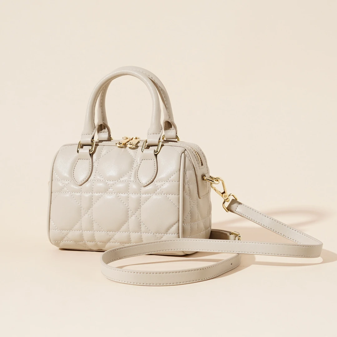 岩牛【双11专属】新款白色时尚女士百搭小众真皮波士顿YN3573