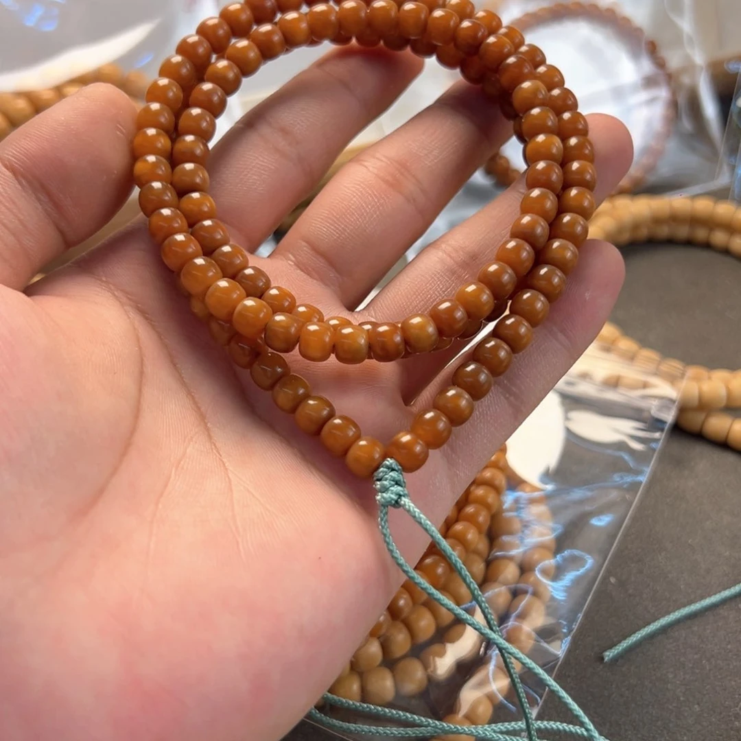 菩提根/象牙果吊坠龙脊全玉化7×6老型108