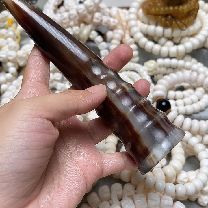 香榧木毛牛角手把件