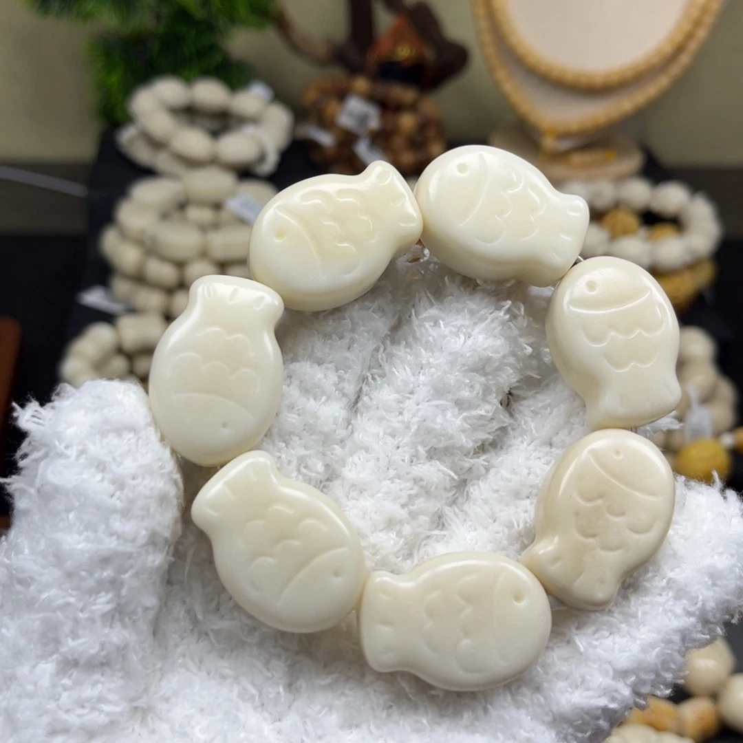 菩提根/象牙果吊坠1.21:25比目鱼