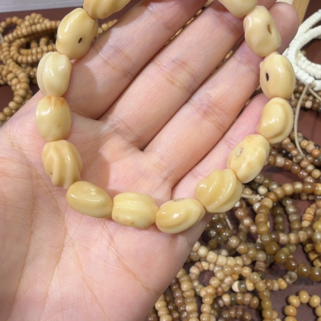 浅***柔龙脊菩提吊坠原籽玉化料单圈15颗