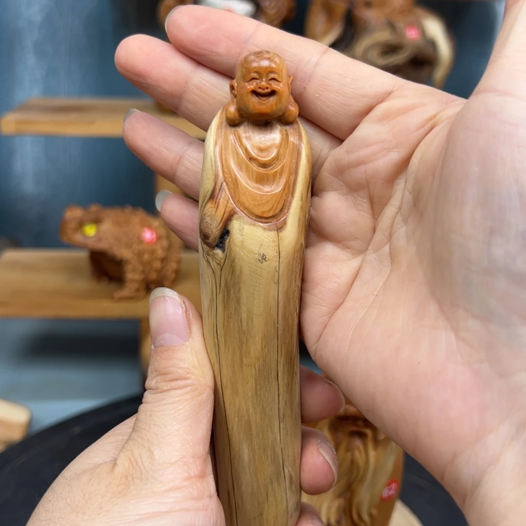 木M**赞崖柏木摆件手把件