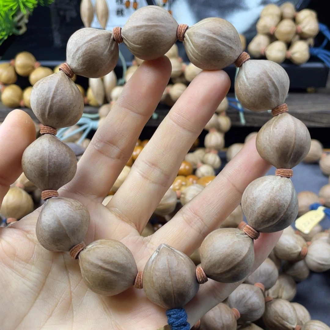 昆***校吊坠橄榄核22x25老料红肉