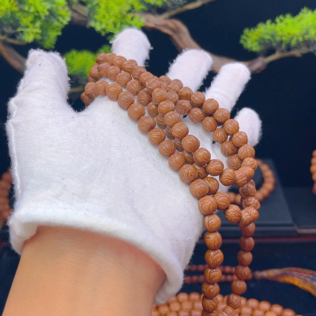 燕***然吊坠桃核野生桃核