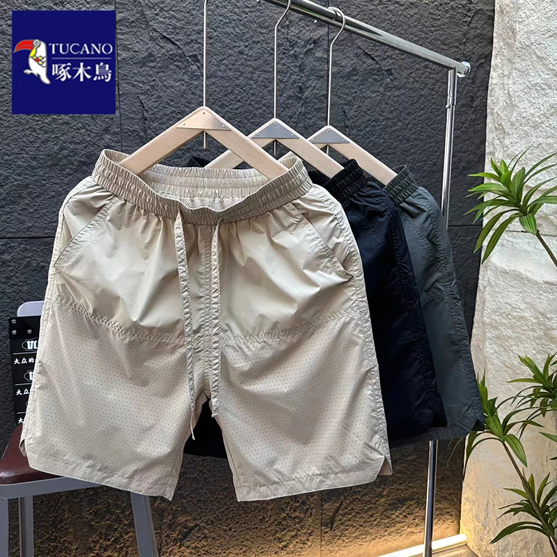 啄木鸟夏季冰丝速干休闲五分裤男士潮流宽松透气时尚运动短裤子男