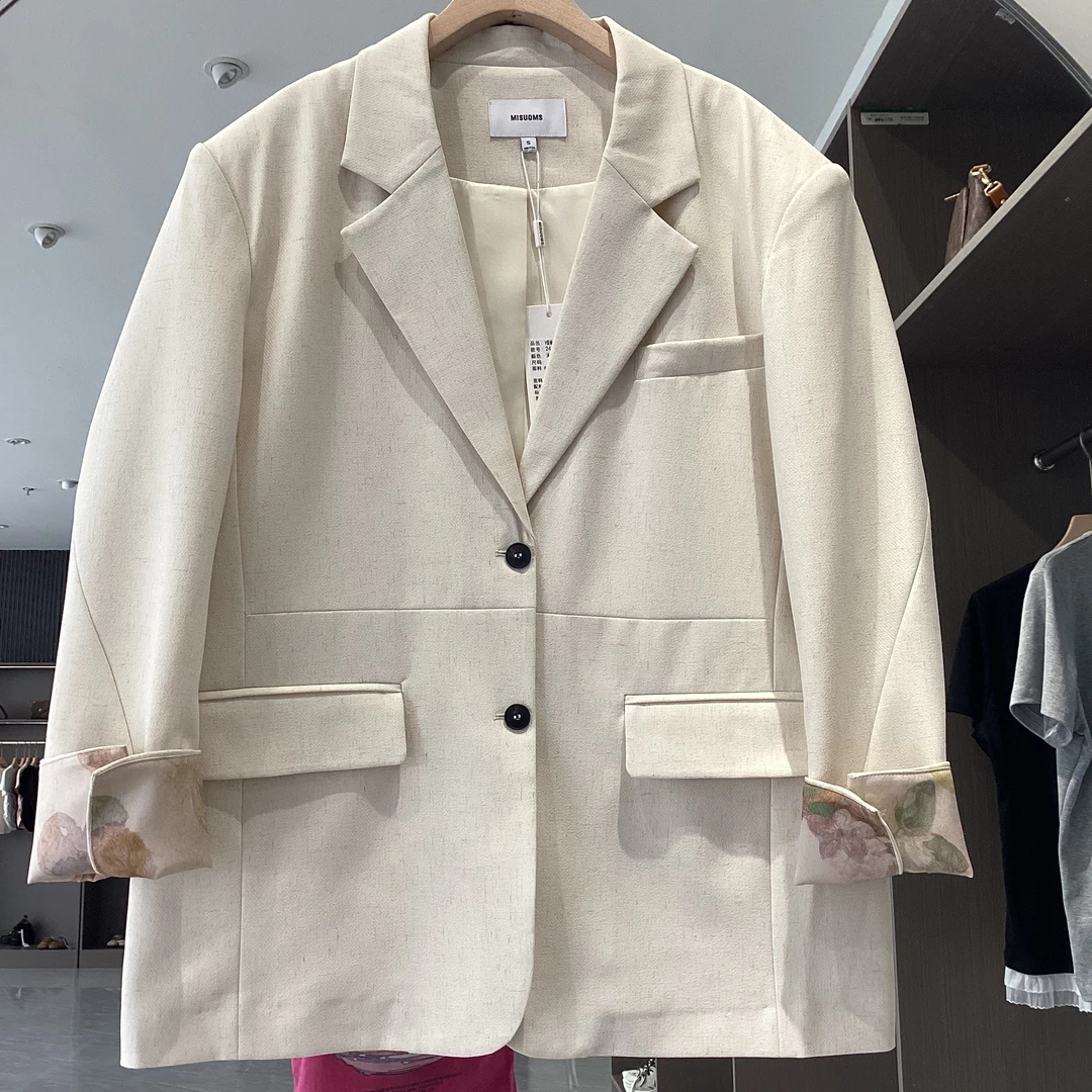 24135  V领袖口生花韩版扩版宽松西装外套