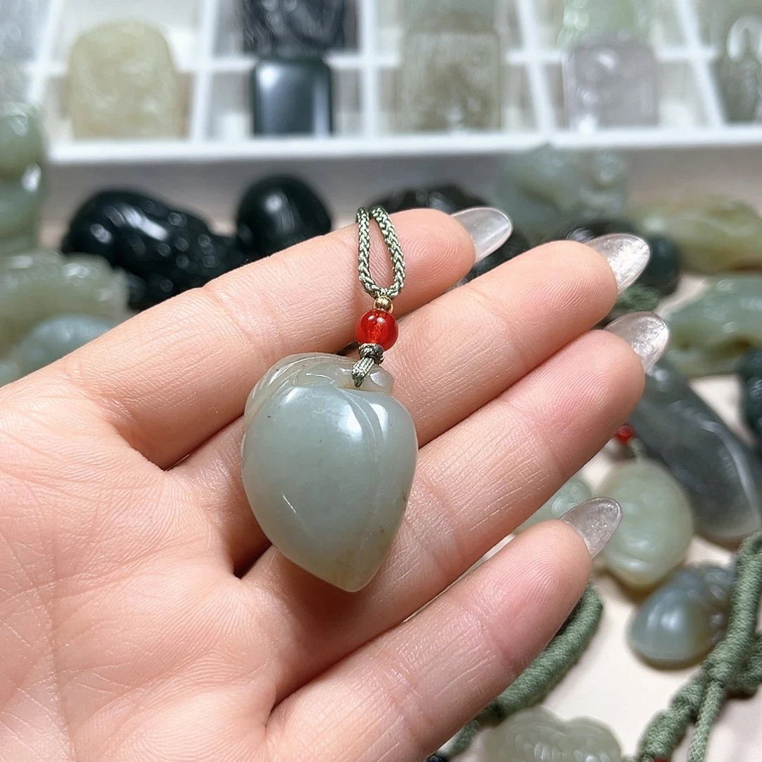 和田玉未镶嵌挂件杏**意