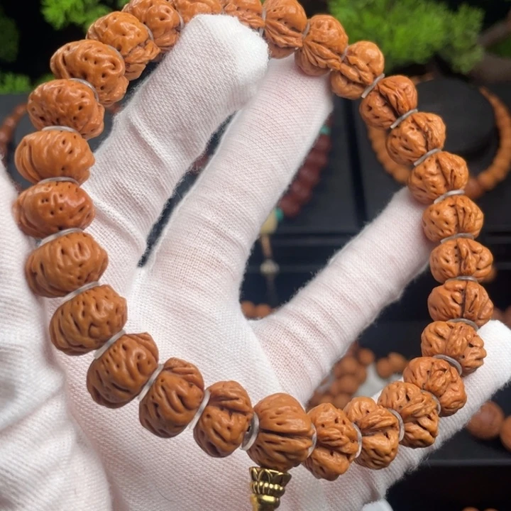 像***行桃核吊坠精品手持