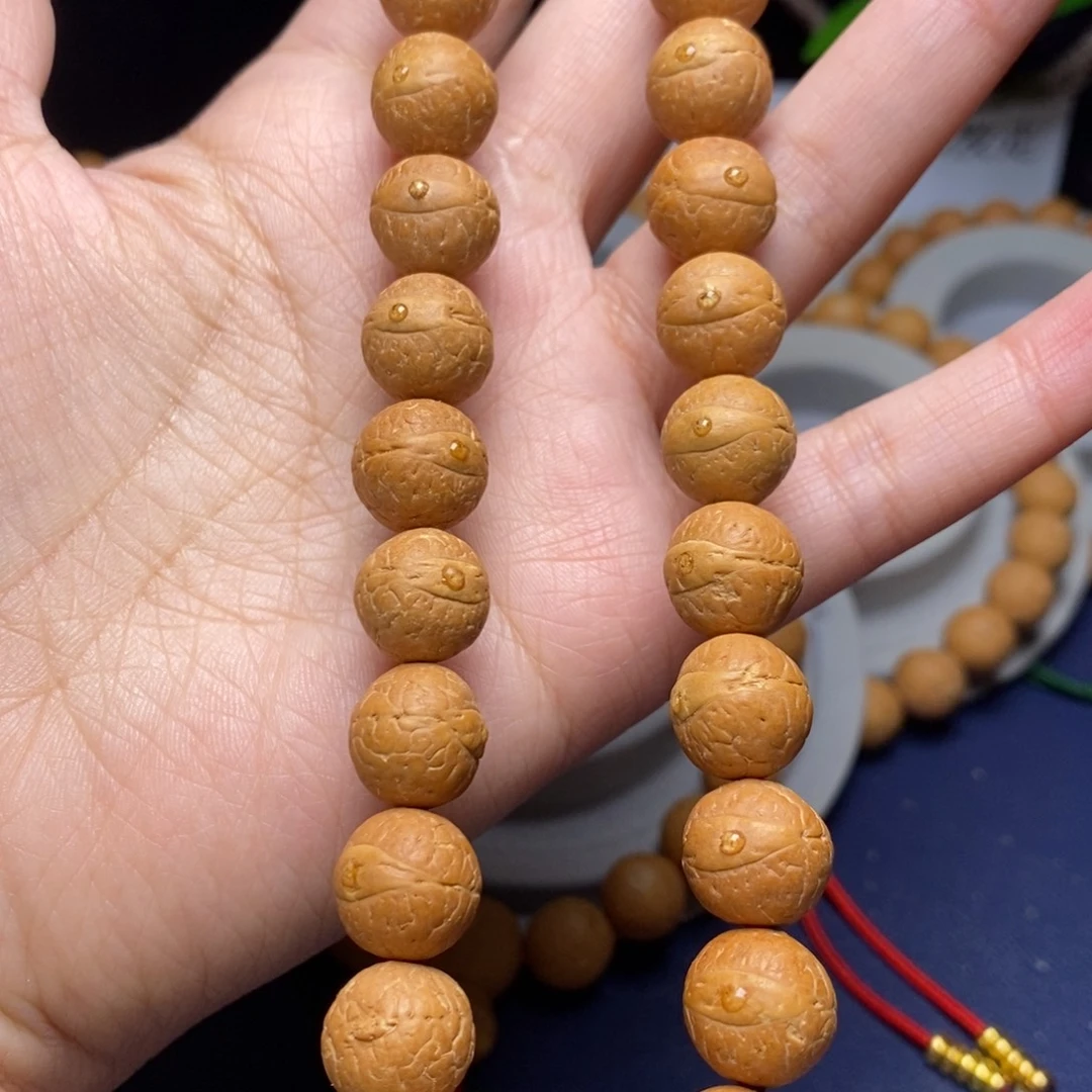 凤眼菩提吊坠12.5手持