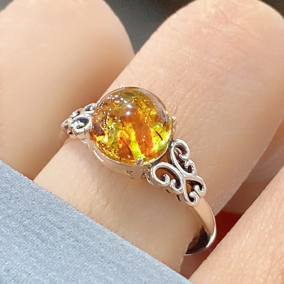 新款镂空蝴蝶圆球花珀戒指