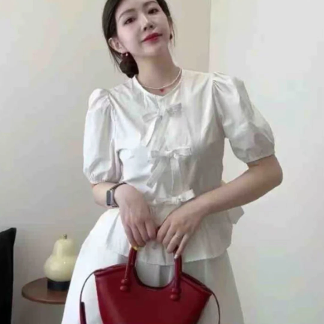 孙优秀推荐法式蝴蝶结系带短袖镂空绑带泡泡袖上衣➕半身裙套装