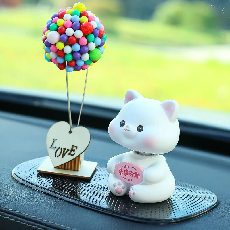 小动物电动车摇头款网红高档卡通公仔莫生气摆件车内中控台摆饰