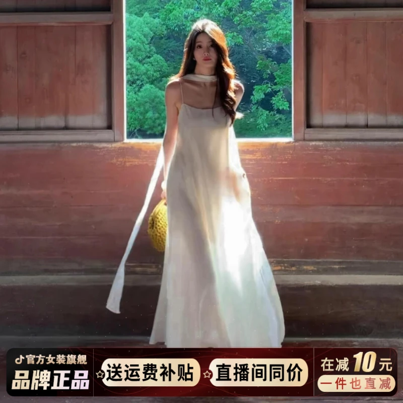 2025新款度假风穿搭白色无袖吊带连衣裙子女夏季法式初恋气质长裙