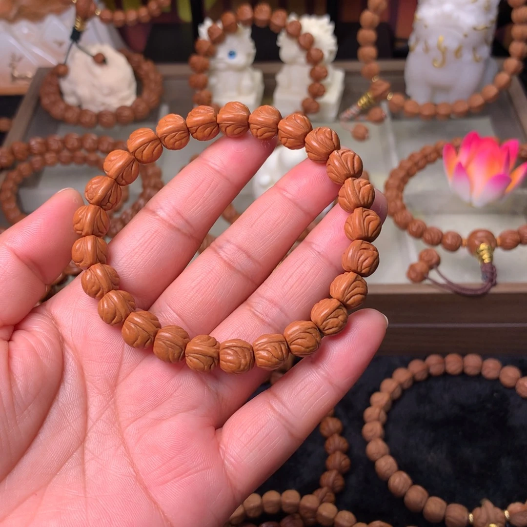 北***极桃核吊坠金玉龙手串10