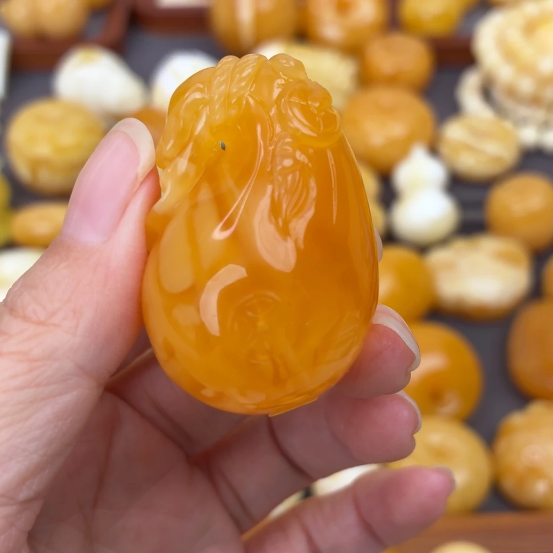 追***点蜜蜡未镶嵌吊坠(不含链)橘红钱袋