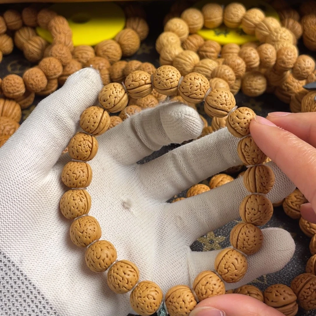 K***6桃核手串野生小肥脐