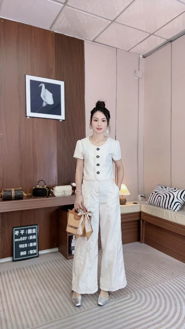 668夏季高端韩版休闲时尚套装女显瘦黑色小香风短袖上衣腿裤两件