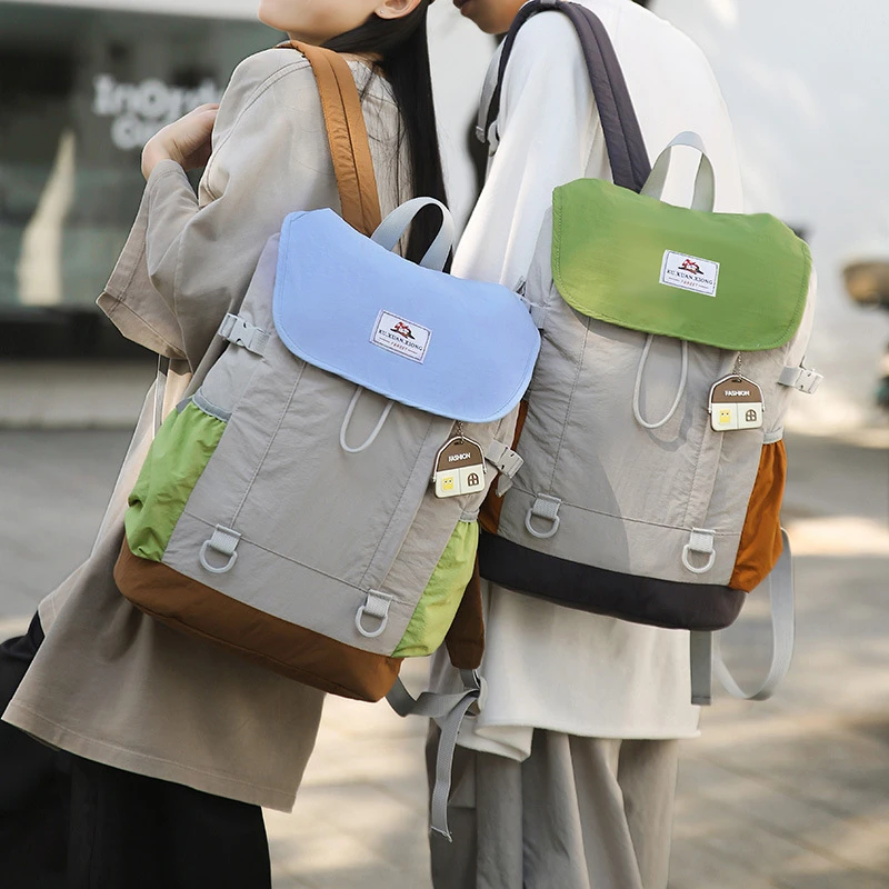 简约设计撞色牛津布双肩包女2025新款休闲运动旅游包森系背包潮