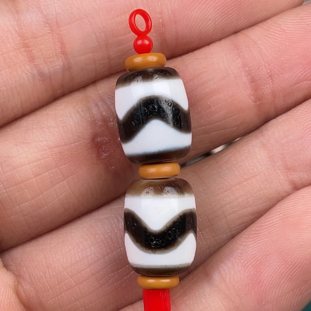 玛瑙/玉髓裸珠虎牙