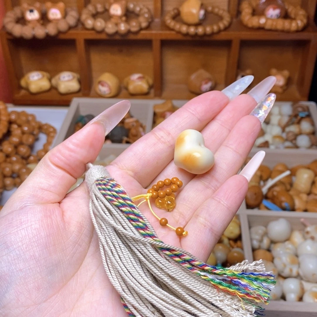 手串猴头核桃小蜜花0.38 爱心 米流苏 橄榄卡环