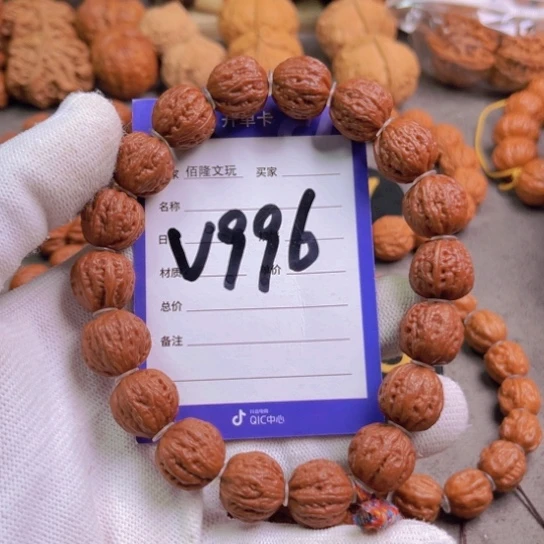 文玩核桃吊坠达*西he tao shou ch