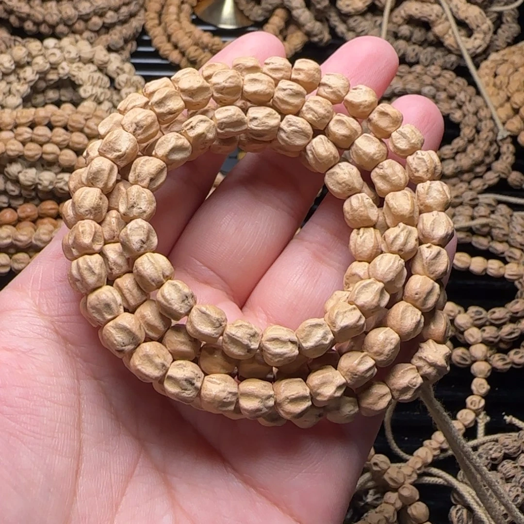 莎***莎柏香籽/百香籽吊坠