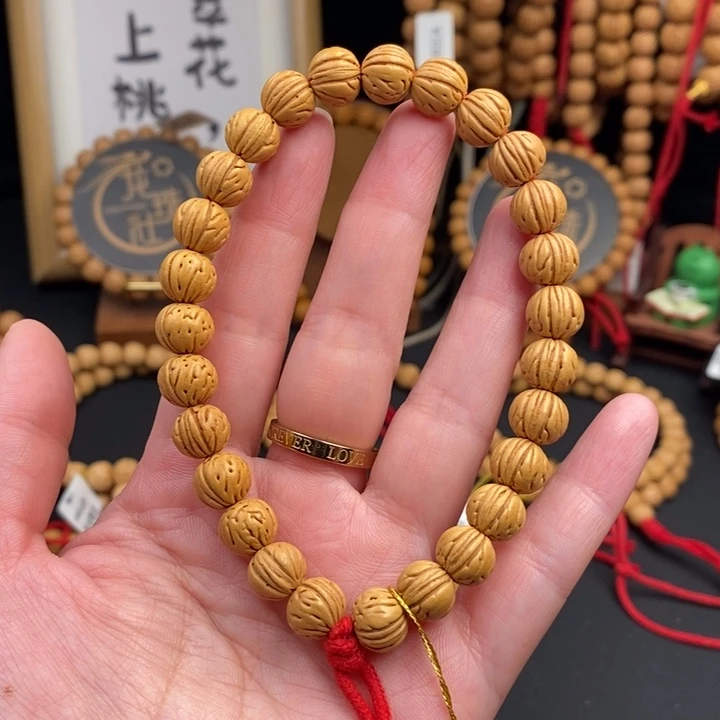 桃核手串凤鸾边尺9.5抛光尺寸误差0.5mm之间