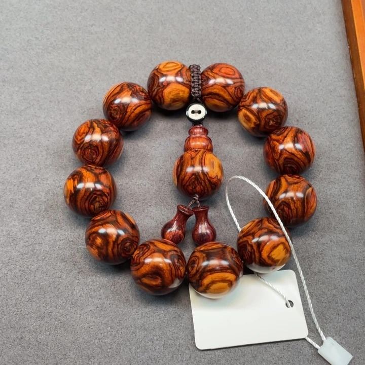 爱***起黄花梨/降香黄檀手串/手链海南黄花梨对眼鬼脸