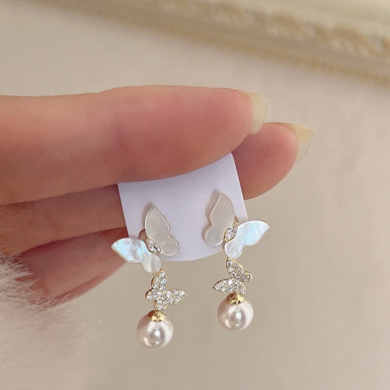 不锈钢仿珍珠项链 丹妮丝蝴蝶予梦春夏新款高级气质精致白贝母珍