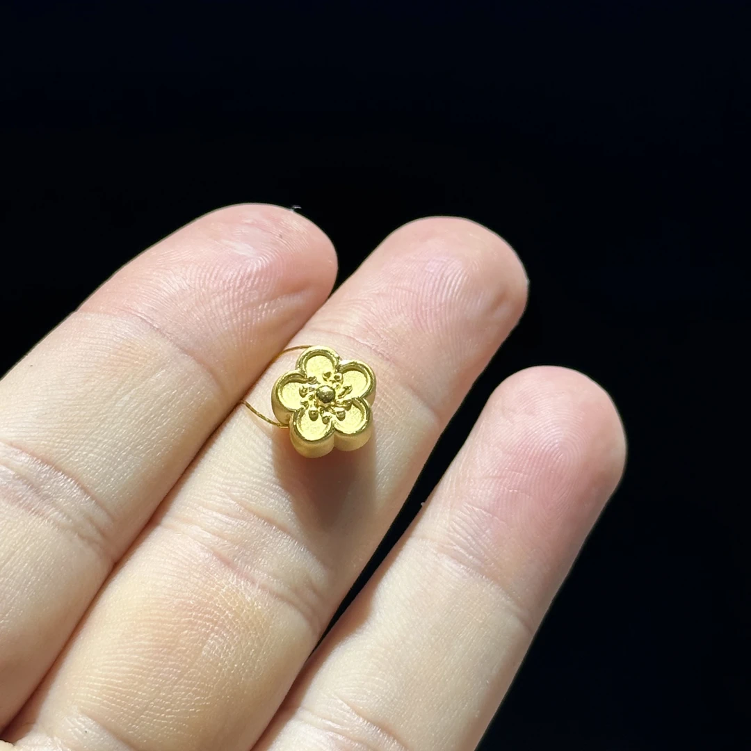 足金999 精品花花通孔 0.947