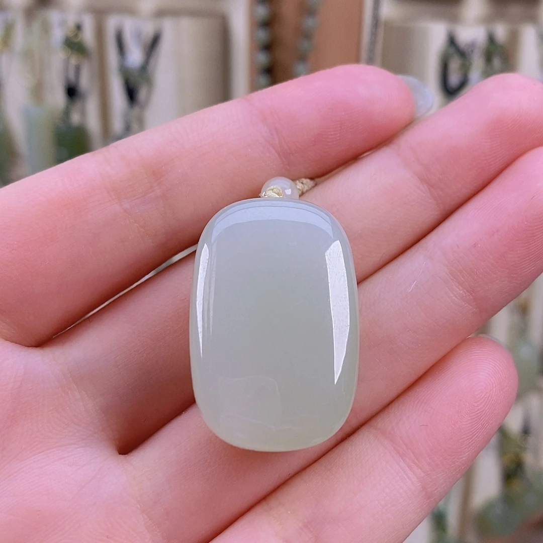 谵***螺和田玉未镶嵌颈饰