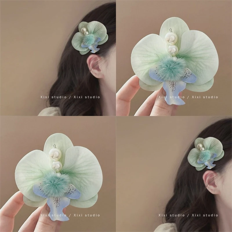 清冷感薄荷绿花朵发夹超仙气质蝴蝶兰边夹2025新款氛围感拍照头饰