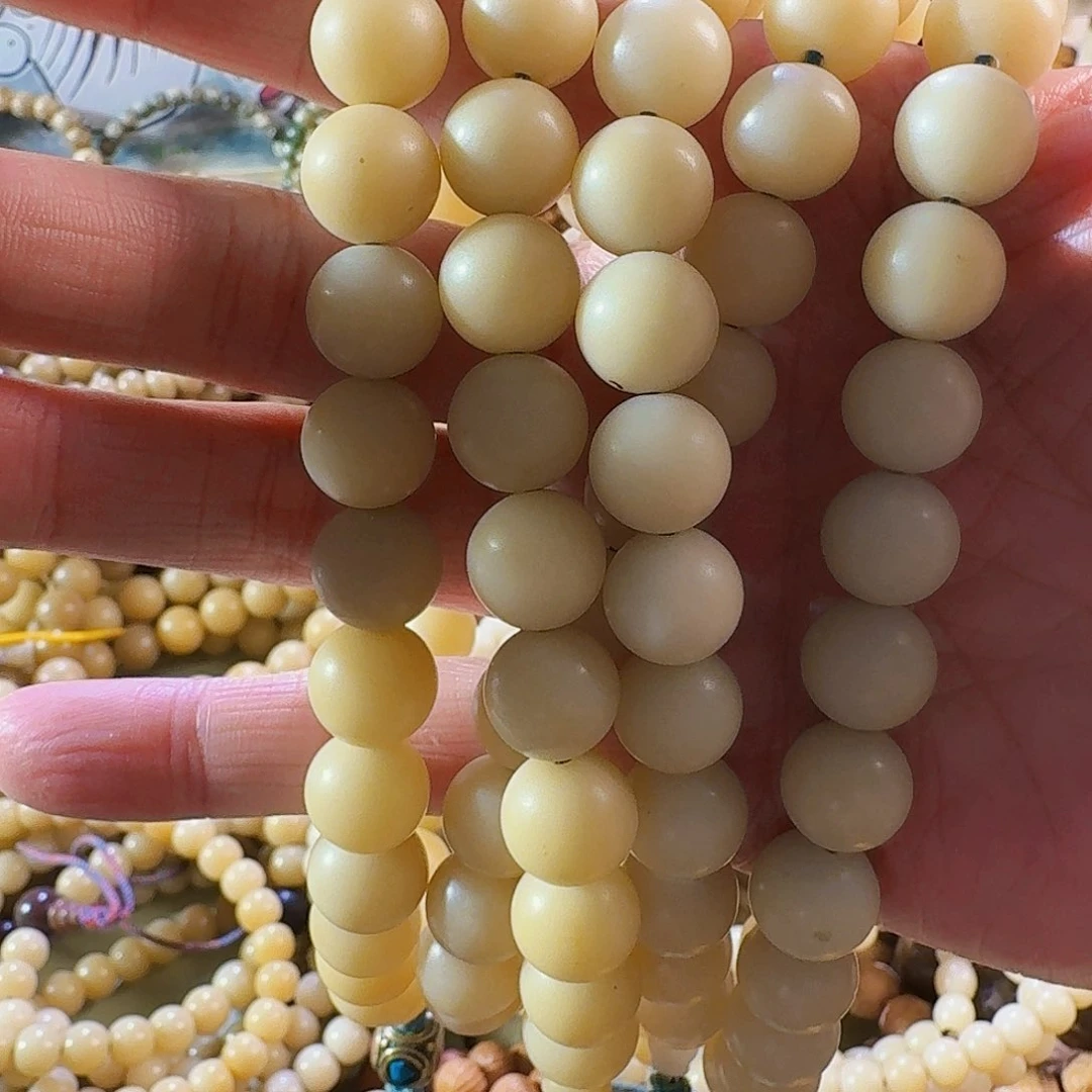 白玉菩提把件迷*兔白玉菩提手持