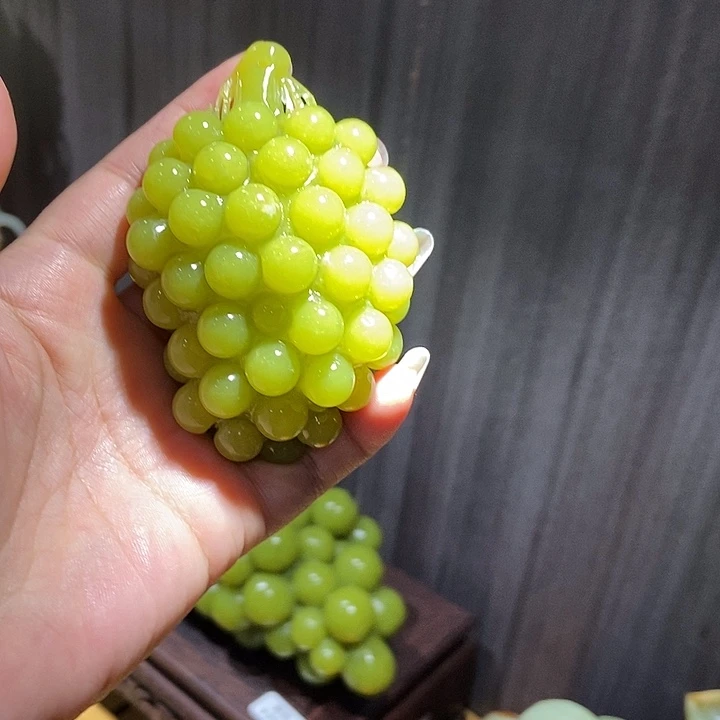 蛇纹石玉手把件合金爱****?