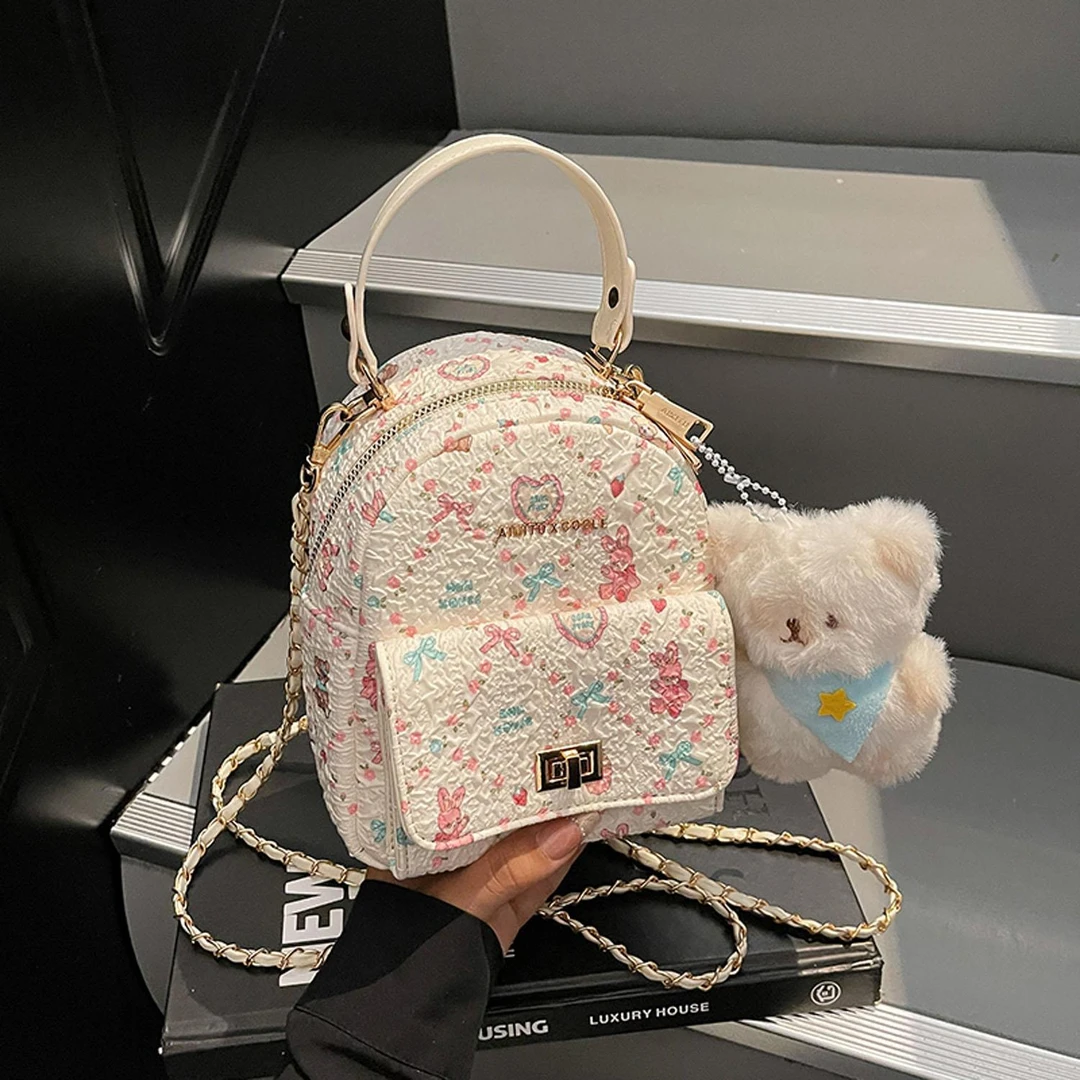 日本品质女包2025新款通勤休闲日常时尚学院风可爱碎花涂鸦双肩包