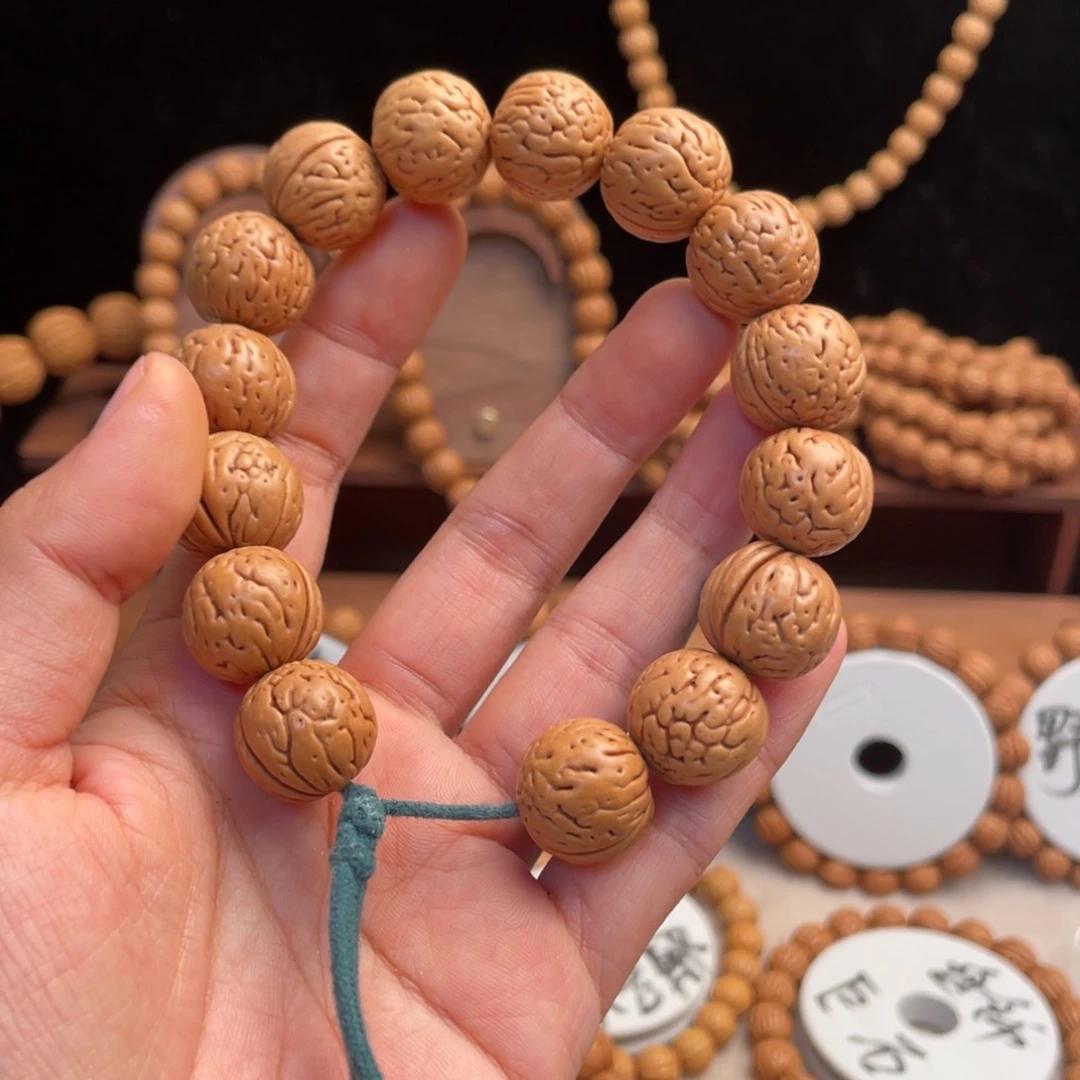 信***岩桃核吊坠桃核手持野生赤红甲