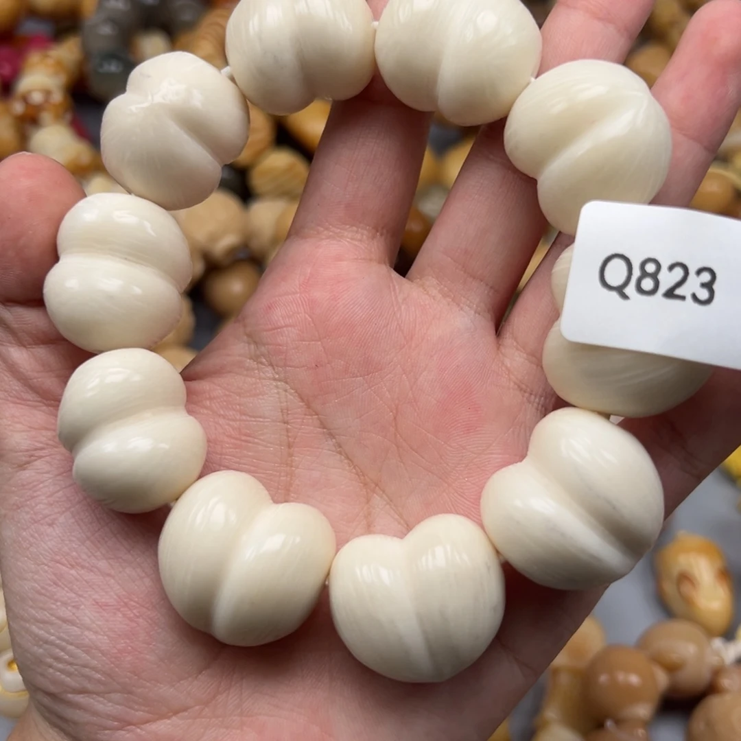 菩提根/象牙果吊坠Q823屁桃20-25瑕疵一串