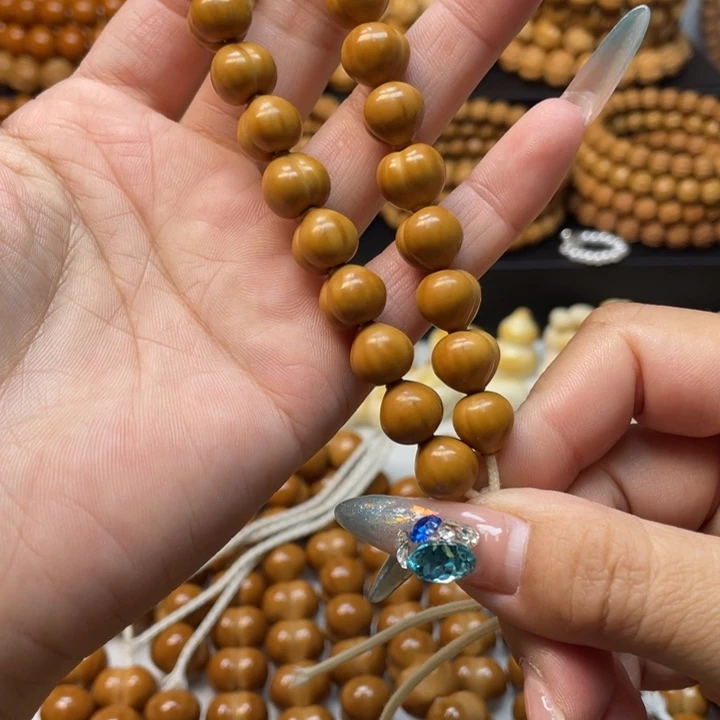 兜***࿐吊坠猴头核桃微瑕小屁桃