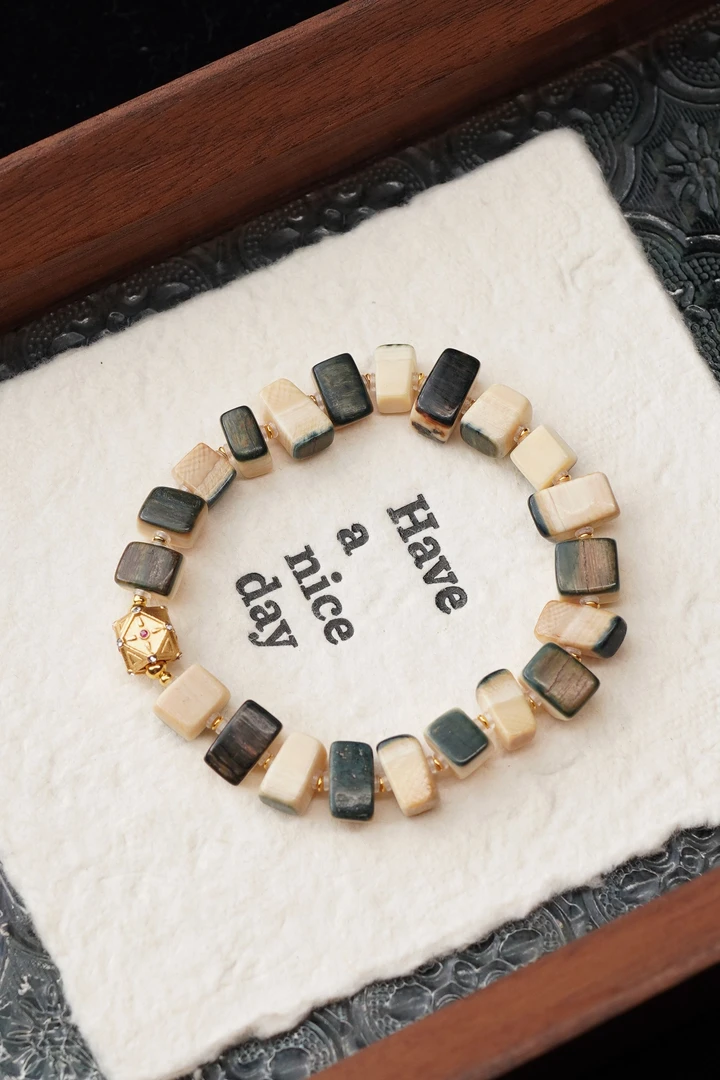 胡了 天然猛犸牙咖料蓝皮随形单圈手串