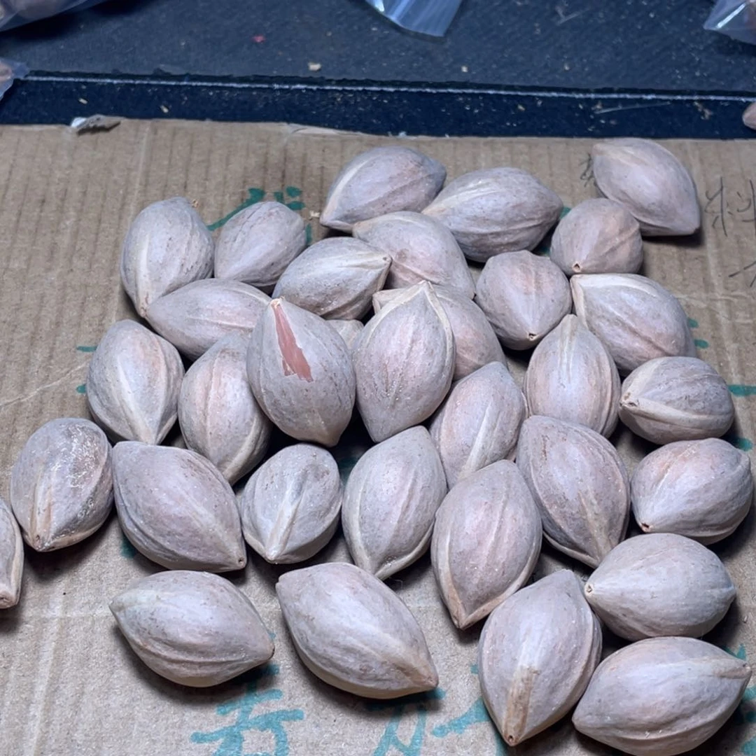 笑***看橄榄核吊坠橄榄核