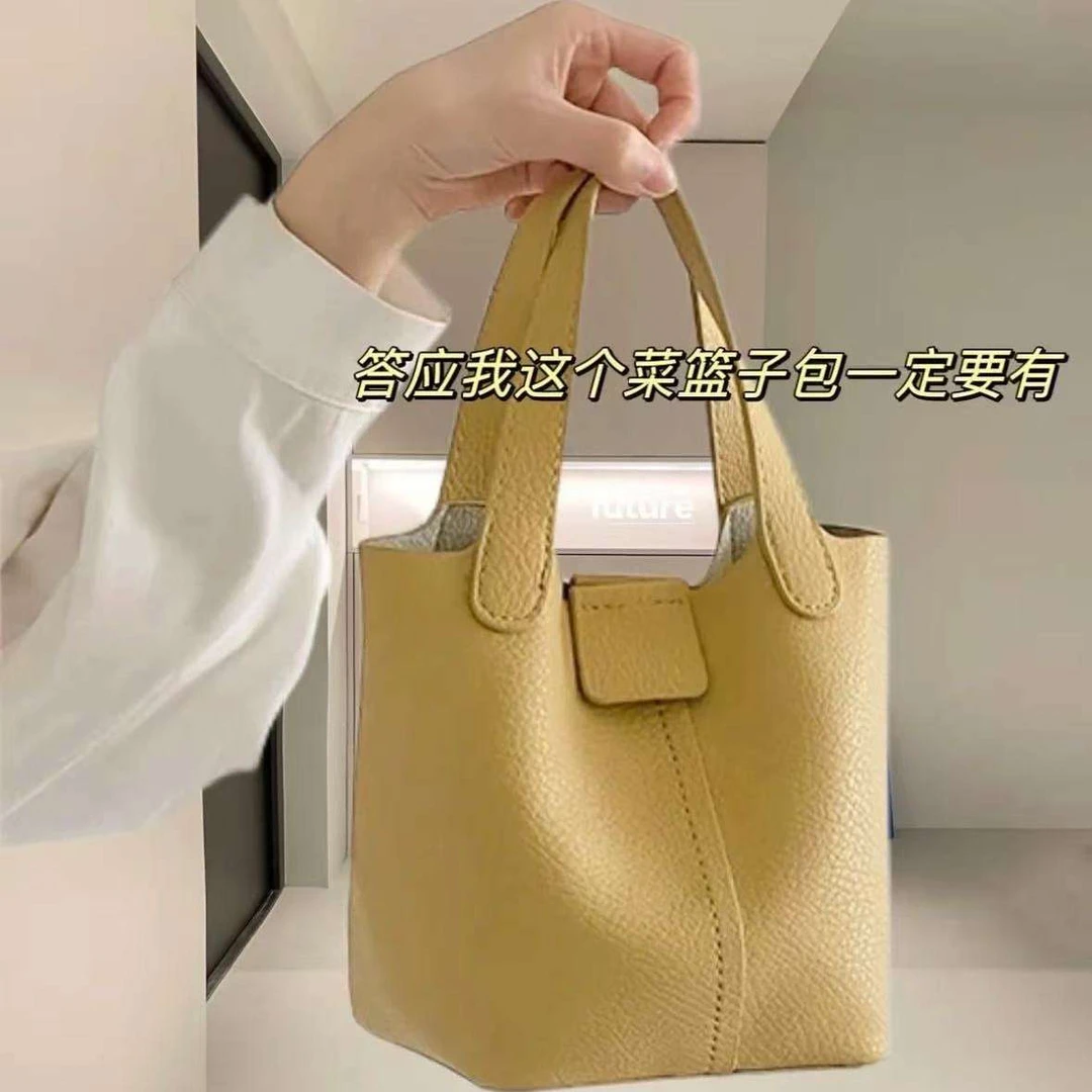 2025新款韩系小众软皮手提水桶包荔枝纹时尚百搭通勤单肩斜挎包女