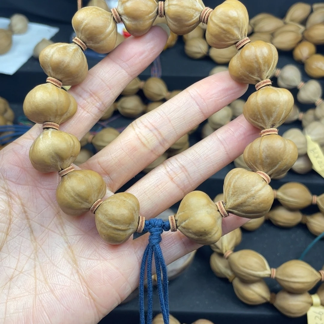 ****S001橄榄核三花蒜头20*18