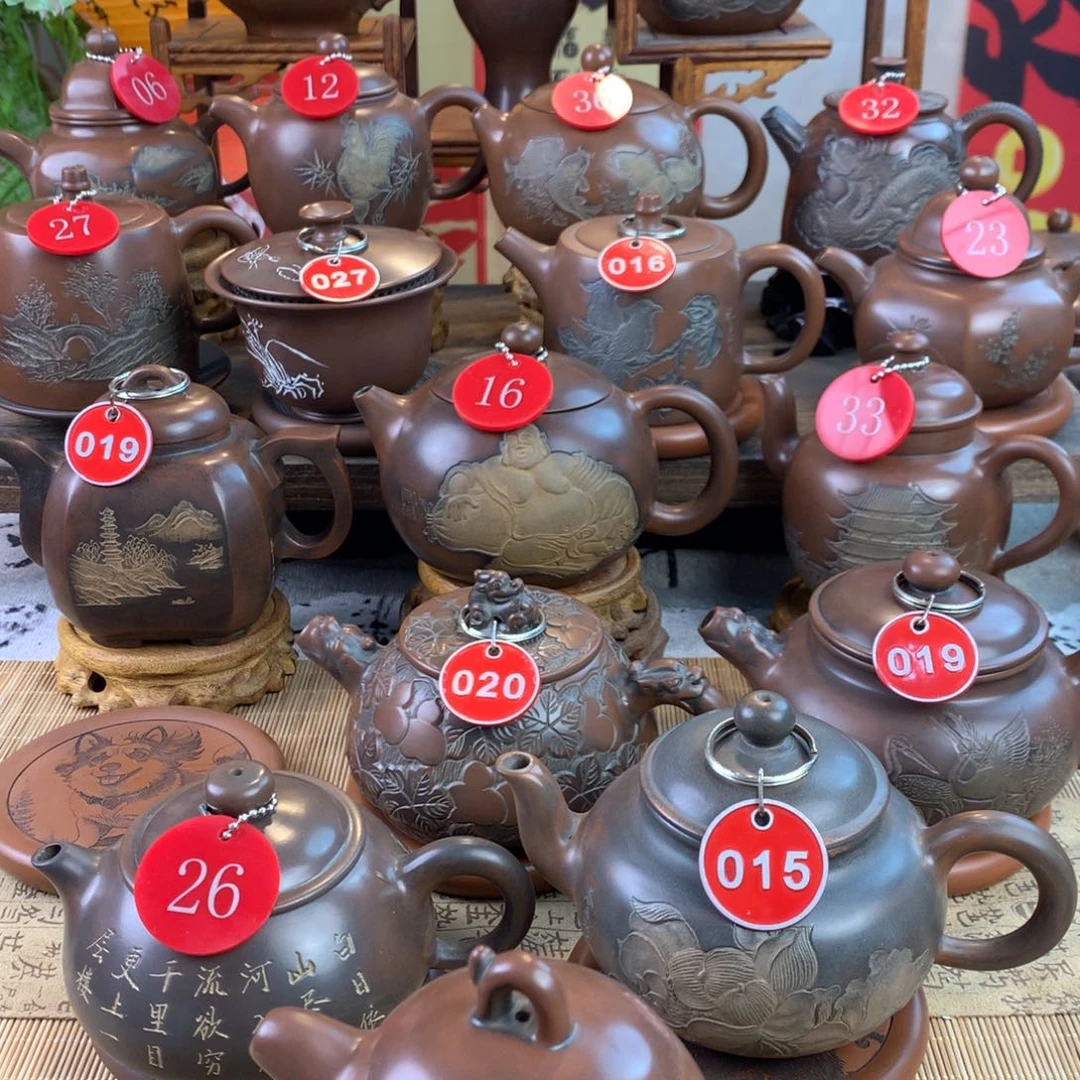 用****5坭兴陶手工刻绘山水壶