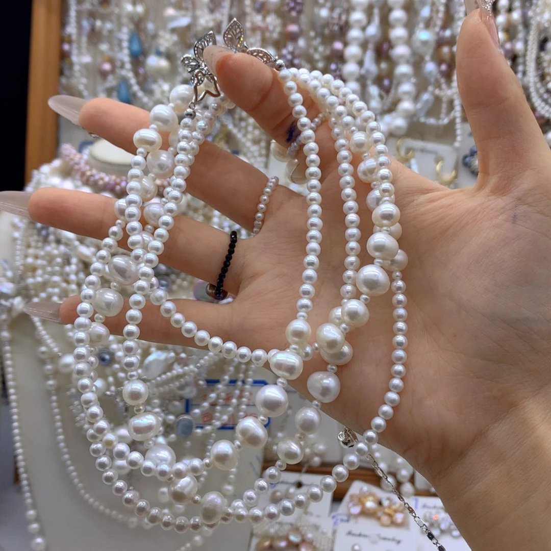 冷****银S925镶嵌淡水珍珠项链耳饰