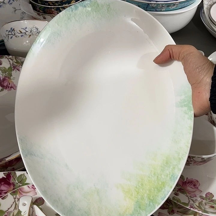 瓷片微瑕骨瓷鱼盘一个