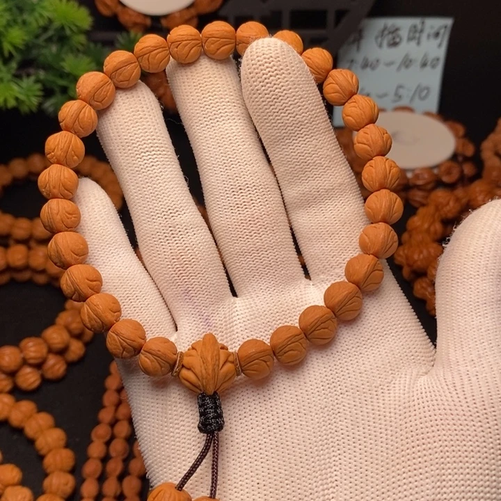 隔***A手串桃核玉龙脊手持